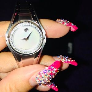 Authentic Women’s Movado Watch With Rotating Head.